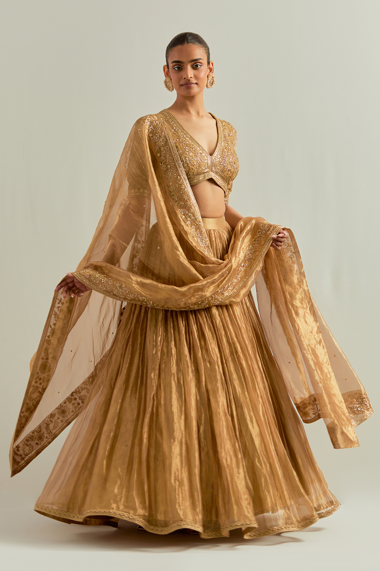 Golden Shimmer Organza Hand Embroidered Wedding Lehenga Set by Ikshita Choudhary at Pernia's Pop Up Shop