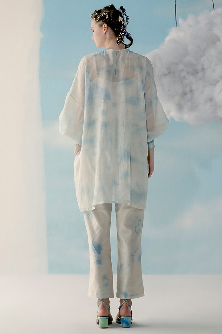 Ice Blue & Off-White Printed Pants by ILk by Shikha and Vinita at Pernia's Pop Up Shop
