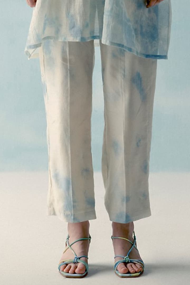 Ice Blue & Off-White Printed Pants by ILk by Shikha and Vinita at Pernia's Pop Up Shop