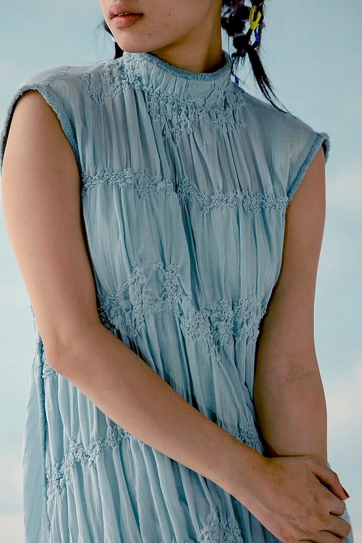 Ice Blue & Off-white Smocked Tiered Twisted Vacation Dress by ILk by Shikha and Vinita at Pernia's Pop Up Shop
