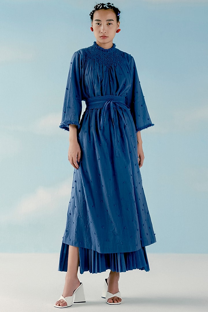 Smoke Blue Smocked & Gathered Pom Pom Vacation Dress by ILk by Shikha and Vinita at Pernia's Pop Up Shop