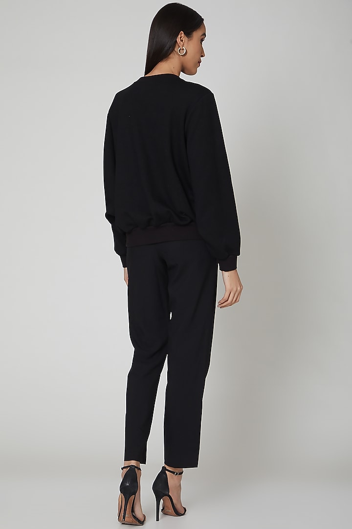 Black Sweatshirt With 3D Laser Cut by Manish Arora at Pernia's Pop Up Shop