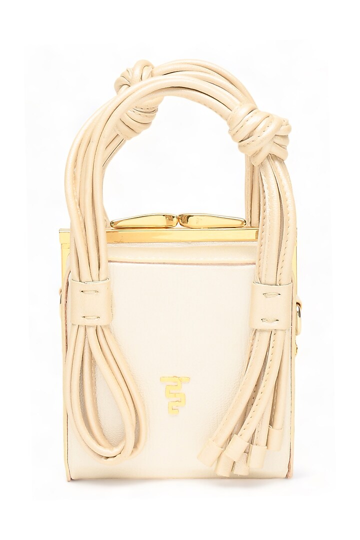 White Faux Leather Love Knot Cube Handbag by Immri at Pernia's Pop Up Shop