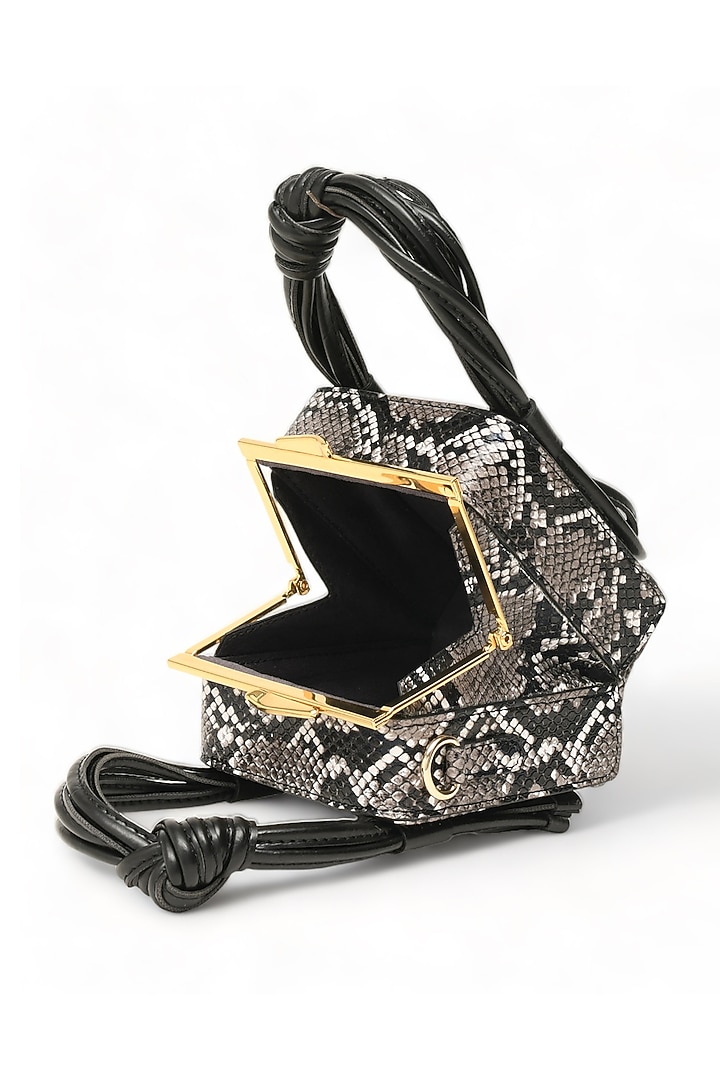Black Faux Leather Love Knot Cube Handbag by Immri at Pernia's Pop Up Shop