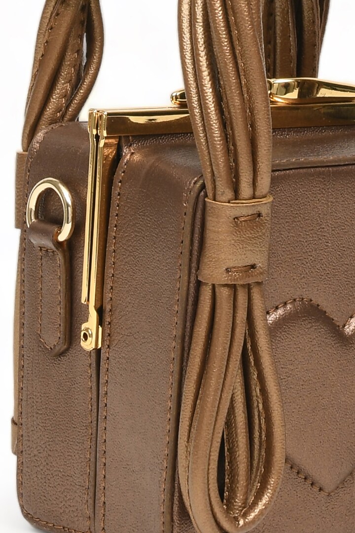 Bronze Faux Leather Love Knot Cube Handbag by Immri at Pernia's Pop Up Shop