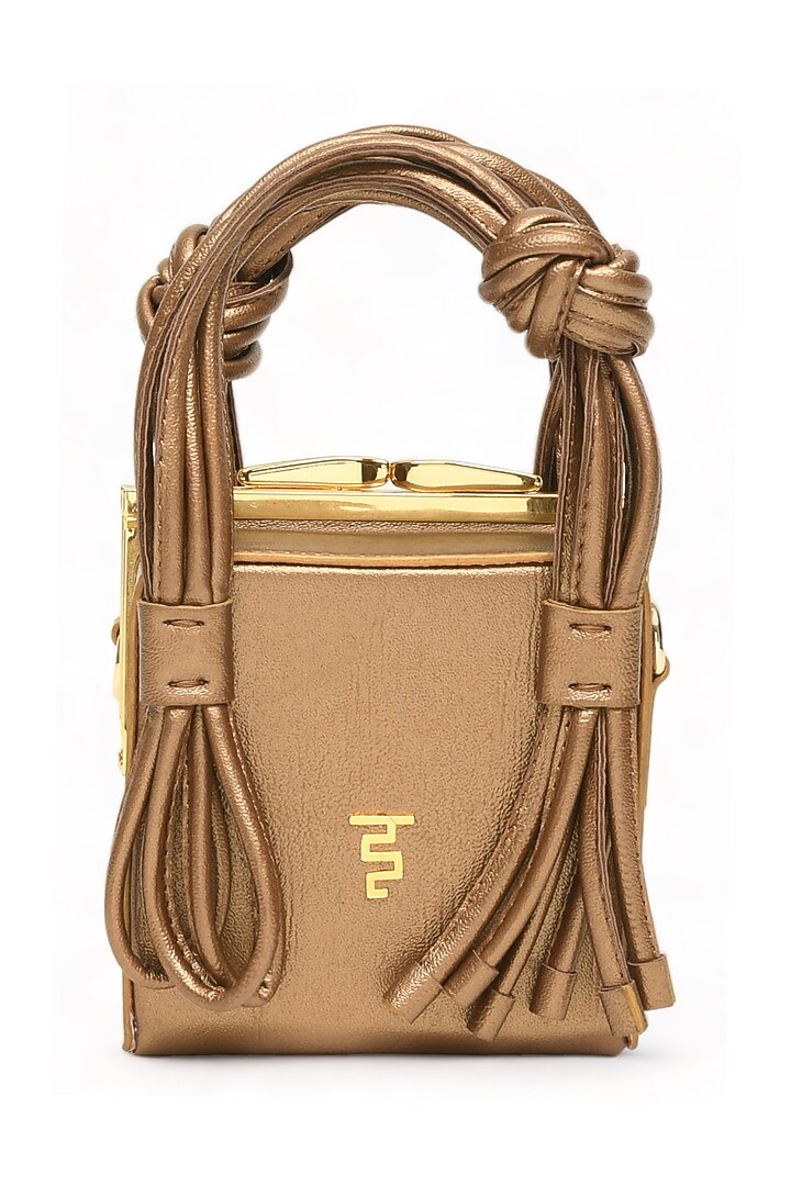 Gold Faux Leather Love Knot Cube Handbag by Immri at Pernia's Pop Up Shop