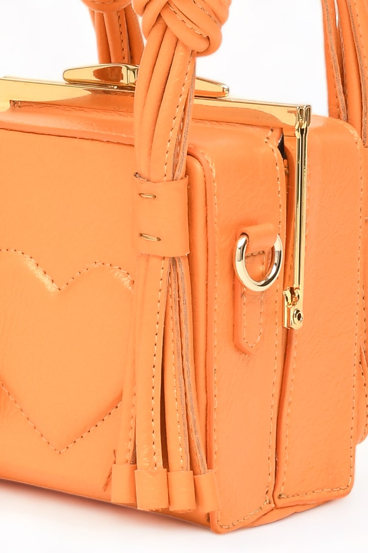 Orange Faux Leather Love Knot Cube Handbag by Immri at Pernia's Pop Up Shop