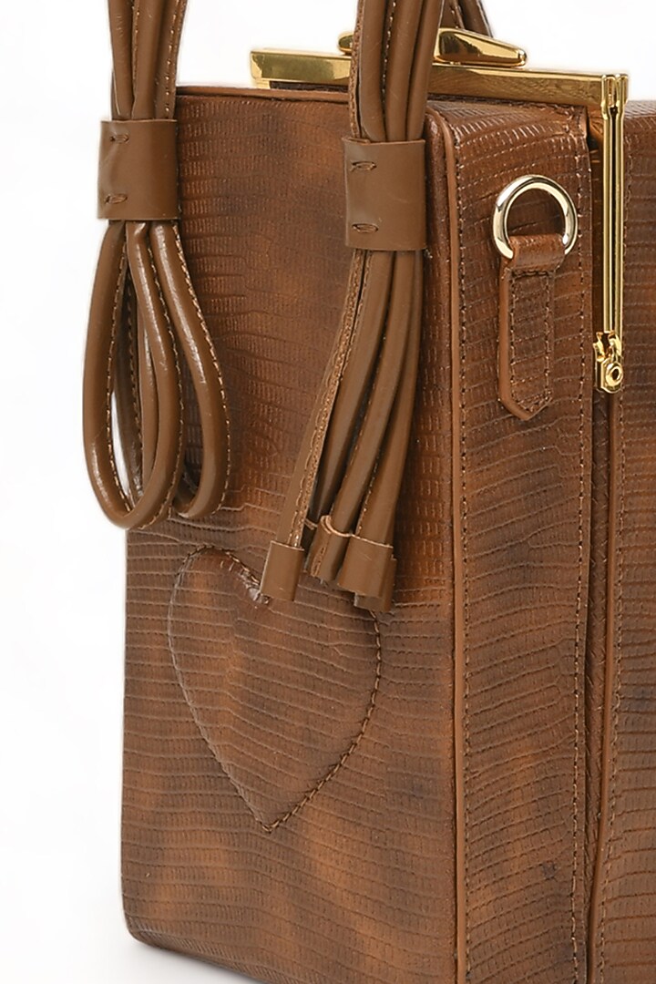 Brown Faux Leather Love Knot Cuboid Handbag by Immri at Pernia's Pop Up Shop