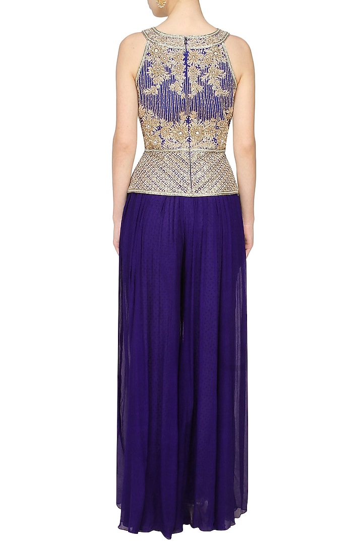 Royal blue fully embroidered peplum top with blue sharara pants available only at Pernia's Pop Up Shop.