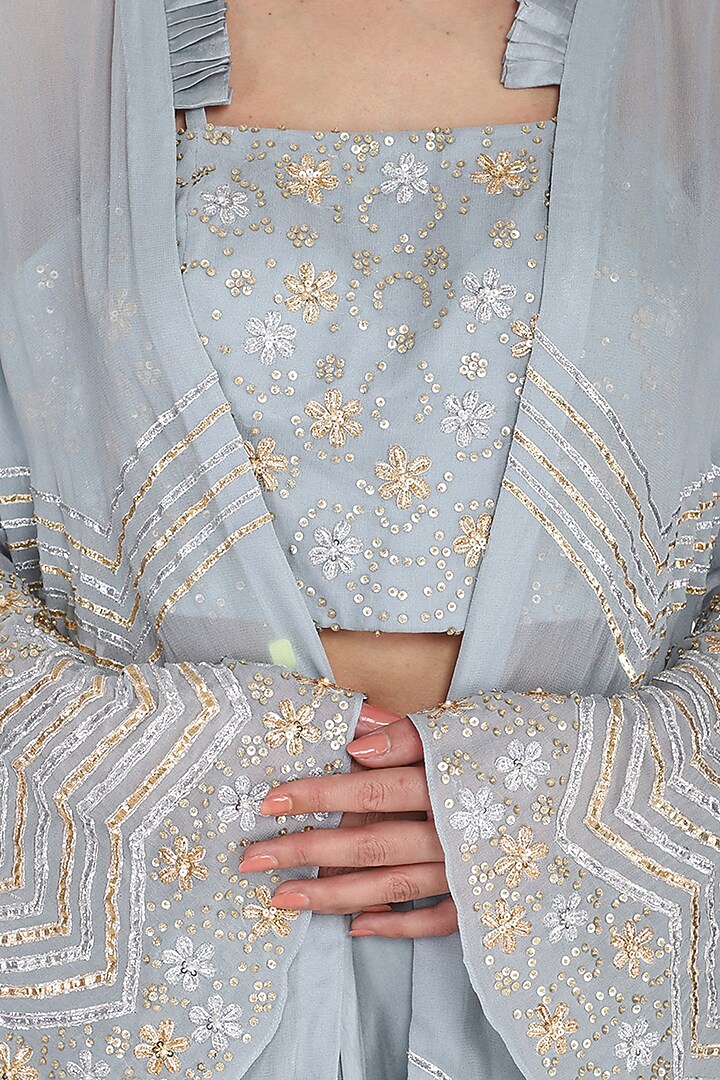 Stone blue embroidered croptop, draped skirt and jacket set available only at Pernia's Pop Up Shop.