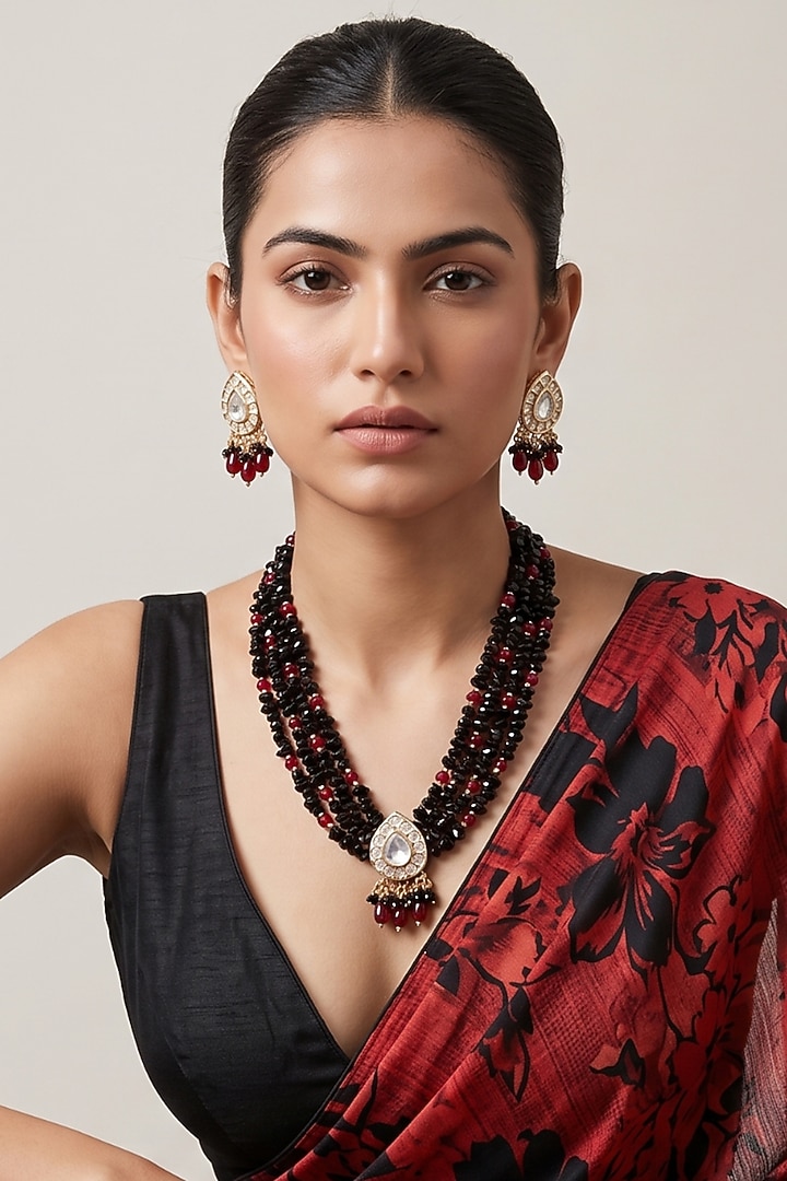 Gold Finish Kundan Polki & Black Onyx Beaded Layered Necklace Set by IndieBlingz at Pernia's Pop Up Shop