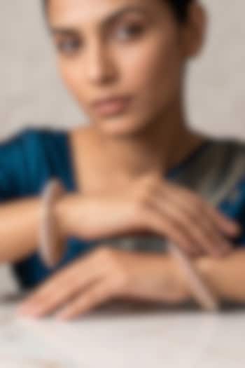 Gold Finish Kundan Polki & Red Enameled Bangles (Set Of 2) by IndieBlingz at Pernia's Pop Up Shop
