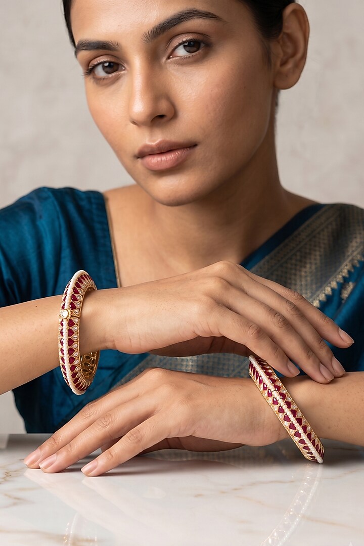 Gold Finish Kundan Polki & Red Enameled Bangles (Set Of 2) by IndieBlingz at Pernia's Pop Up Shop