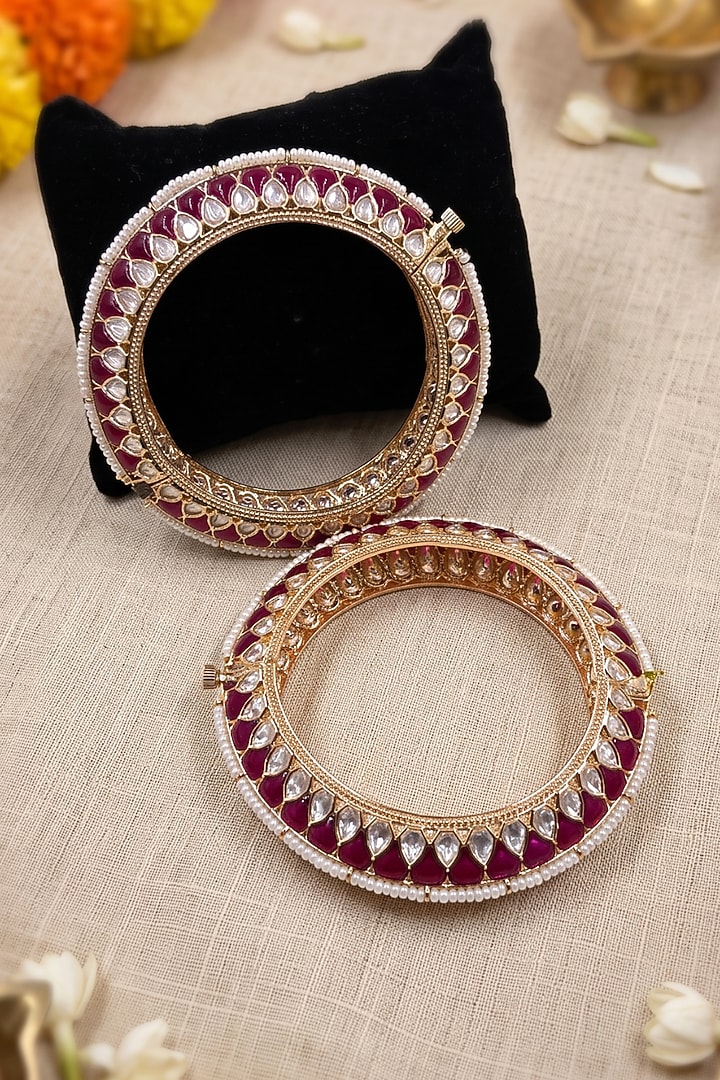 Gold Finish Kundan Polki & Red Enameled Bangles (Set Of 2) by IndieBlingz at Pernia's Pop Up Shop