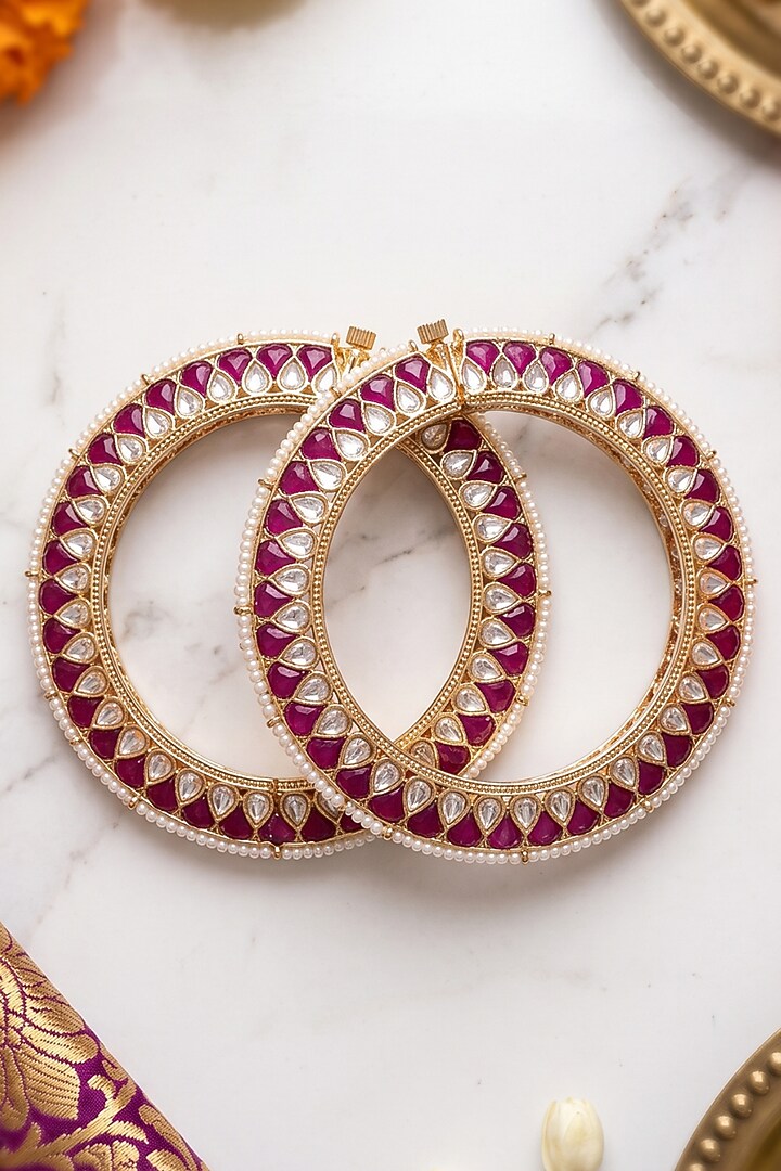 Gold Finish Kundan Polki & Red Enameled Bangles (Set Of 2) by IndieBlingz at Pernia's Pop Up Shop