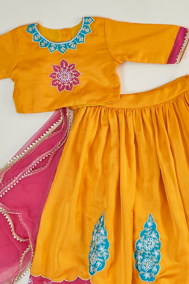Yellow Silk Applique Embroidered Lehenga Set For Girls by Inspired Needleworks at Pernia's Pop Up Shop