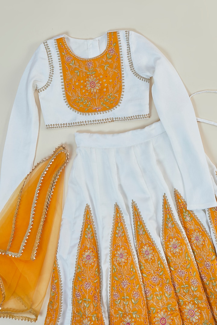 Off-White & Yellow Silk Applique Embroidered Lehenga Set For Girls by Inspired Needleworks at Pernia's Pop Up Shop