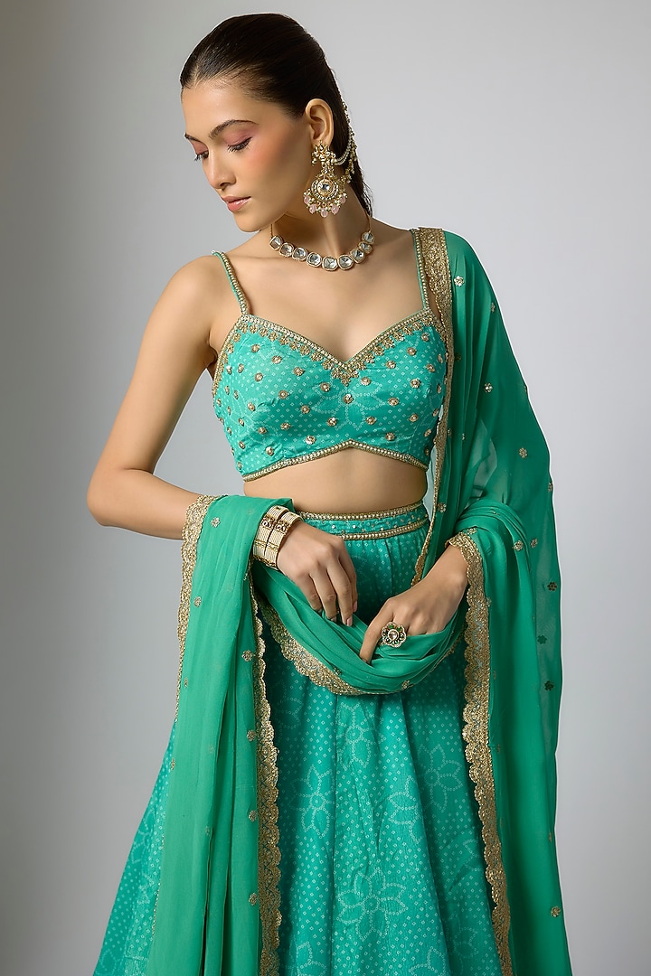 Teal Crepe & Georgette Bandhani Printed Wedding Lehenga Set by Indian Wardrobe at Pernia's Pop Up Shop