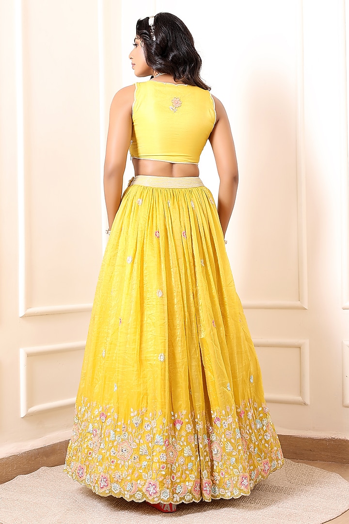 Yellow Crinkled Silk Blend Floral Embroidered Wedding Lehenga Set by Indian Wardrobe at Pernia's Pop Up Shop
