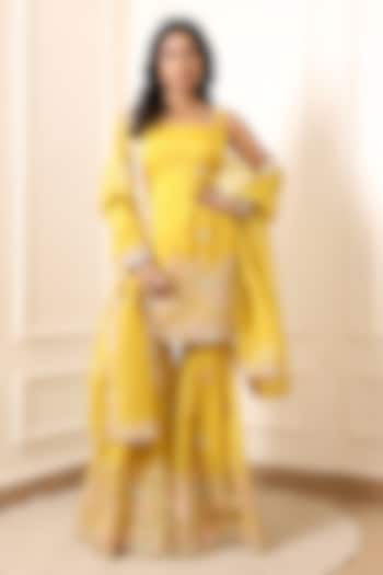 Yellow Crinkled Silk Blend Hand Embroidered Party Wear Sharara Set by Indian Wardrobe at Pernia's Pop Up Shop