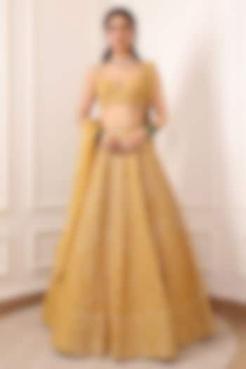 Mustard Yellow Georgette Thread & Floral Motif Embroidered Wedding Lehenga Set by Indian Wardrobe at Pernia's Pop Up Shop