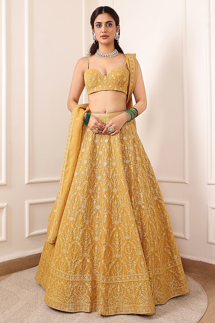 Mustard Yellow Georgette Thread & Floral Motif Embroidered Wedding Lehenga Set by Indian Wardrobe at Pernia's Pop Up Shop
