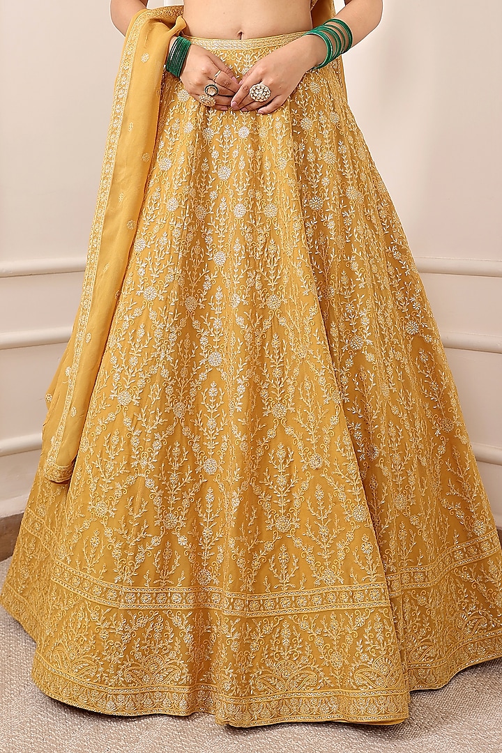 Mustard Yellow Georgette Thread & Floral Motif Embroidered Wedding Lehenga Set by Indian Wardrobe at Pernia's Pop Up Shop