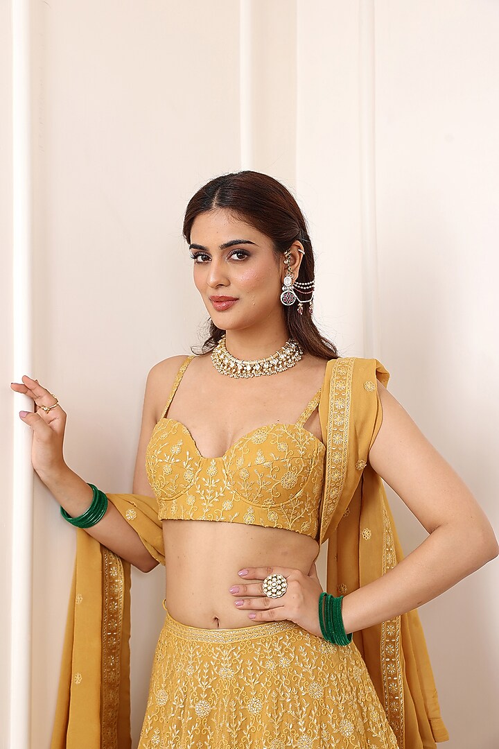 Mustard Yellow Georgette Thread & Floral Motif Embroidered Wedding Lehenga Set by Indian Wardrobe at Pernia's Pop Up Shop
