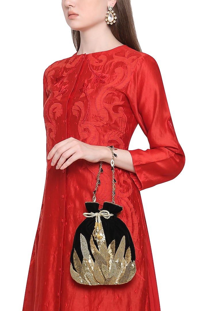 Gold and black embroidered potli bag available only at Pernia's Pop Up Shop.