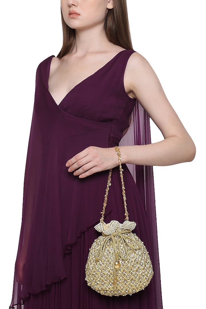 Gold floral embroidered potli bag available only at Pernia's Pop Up Shop.