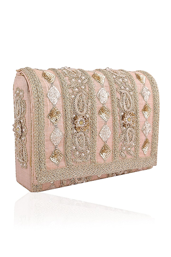 Inayat presents Blush peach and gold embroidered flapover clutch available only at Pernia's Pop Up Shop.