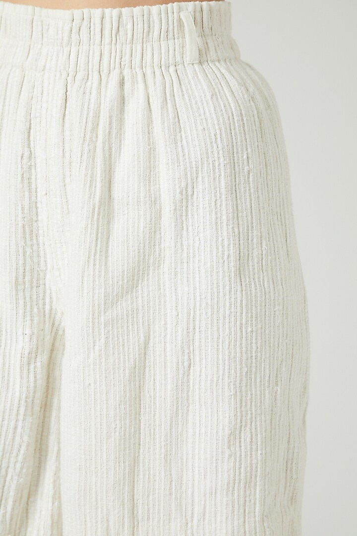 White Pleated Shorts by Iro Iro at Pernia's Pop Up Shop