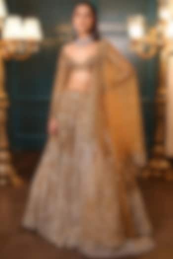 Gold & Silver Ombre Net Sequins Embroidered Bridal Lehenga Set by Isa by Dolly Wahal at Pernia's Pop Up Shop