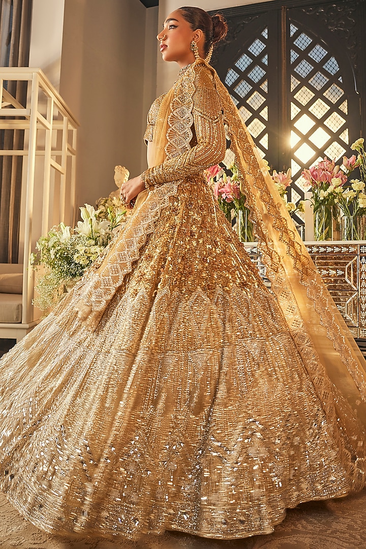 Gold & Silver Ombre Net Sequins Embroidered Bridal Lehenga Set by Isa by  Dolly Wahal at Pernia's Pop Up Shop 2026