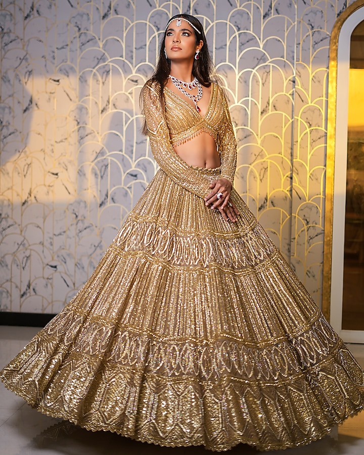 Dark Gold Net Hand Embroidered Lehenga Set by Isa by Dolly Wahal