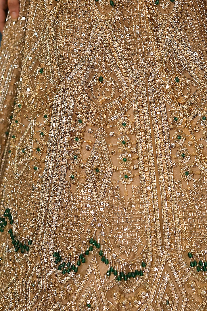 Gold Net Floral Embroidered Bridal Lehenga Set by Isa by Dolly Wahal at Pernia's Pop Up Shop