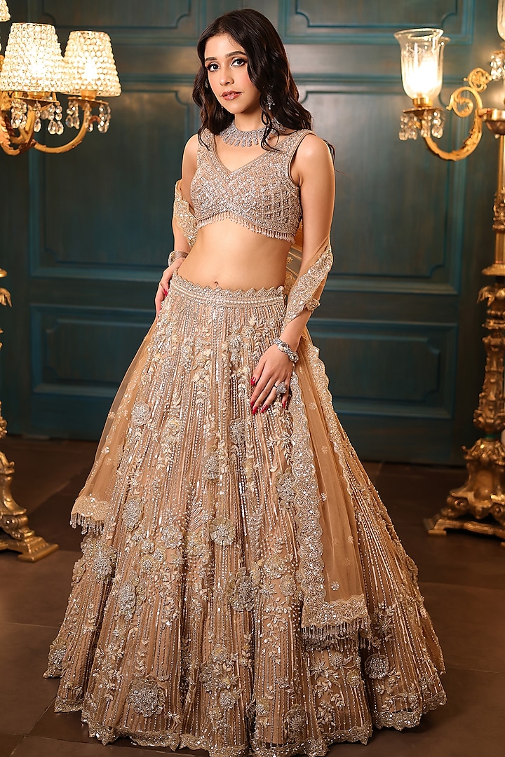 Gold Net Hand Embroidered Bridal Lehenga Set by Isa by Dolly Wahal at Pernia's Pop Up Shop