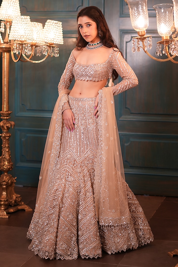 Light Gold Net Sequins Embroidered Bridal Lehenga Set by Isa by Dolly Wahal at Pernia's Pop Up Shop