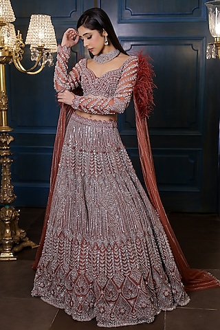 Peachy Brown Net Cutdana Embroidered Lehenga Set by Isa by Dolly Wahal