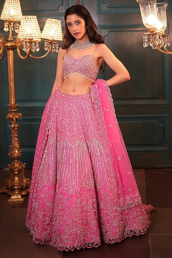 Pink Net Floral Embroidered Bridal Lehenga Set by Isa by Dolly Wahal at Pernia's Pop Up Shop