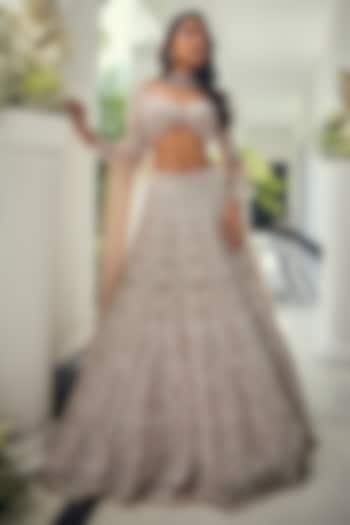 Dusty Pink Net Cutdana Embellished Bridal Lehenga Set by Isa by Dolly Wahal at Pernia's Pop Up Shop