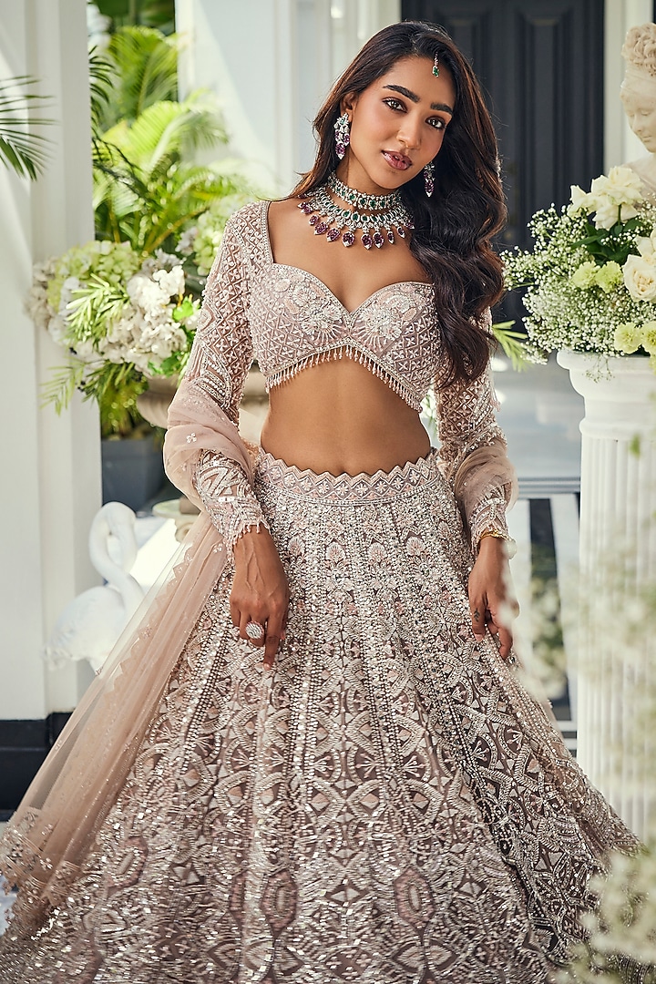 Dusty Pink Net Cutdana Embellished Bridal Lehenga Set by Isa by Dolly Wahal at Pernia's Pop Up Shop