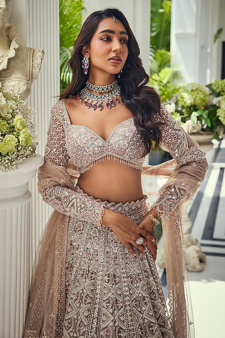 Dusty Pink Net Cutdana Embellished Bridal Lehenga Set by Isa by Dolly Wahal at Pernia's Pop Up Shop