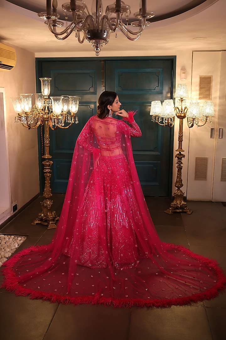 Hot Pink Net Sequins Embroidered Bridal Lehenga Set by Isa by Dolly Wahal at Pernia's Pop Up Shop
