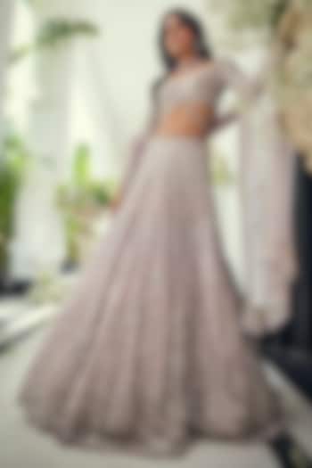 Lilac Net Sequins & Cutdana Embroidered Bridal Lehenga Set by Isa by Dolly Wahal at Pernia's Pop Up Shop