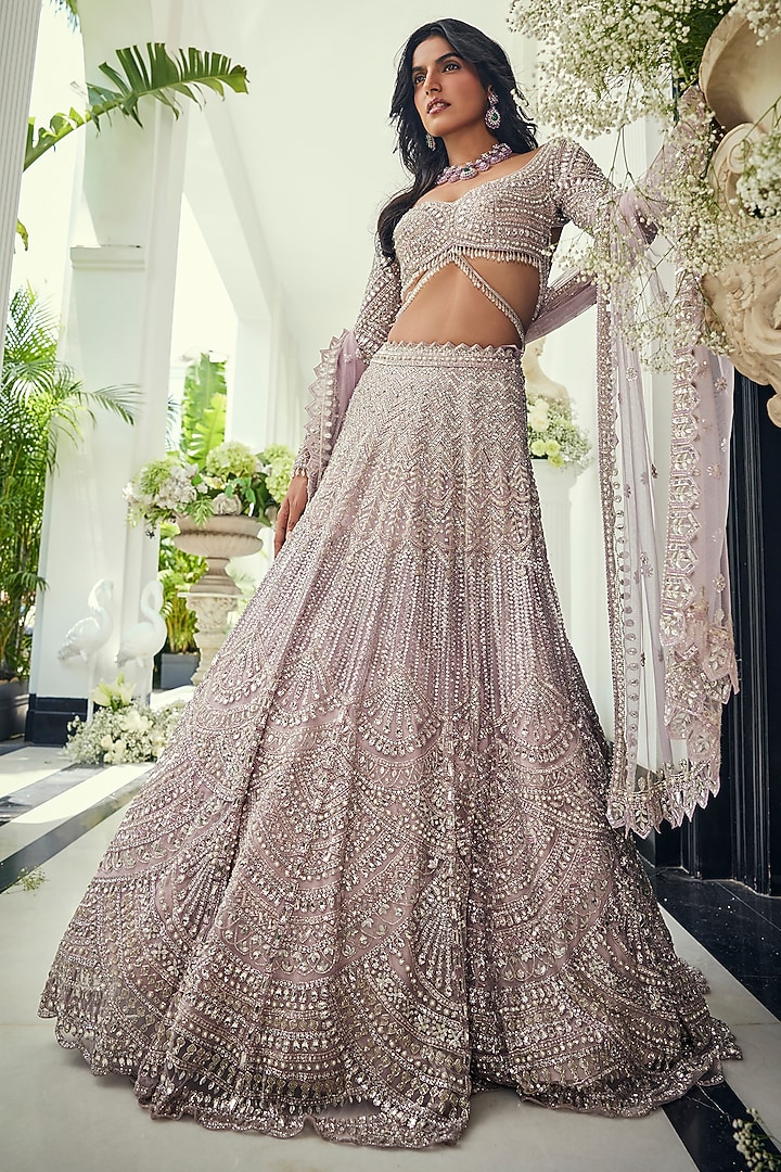 Lilac Net Sequins & Cutdana Embroidered Bridal Lehenga Set by Isa by Dolly Wahal at Pernia's Pop Up Shop