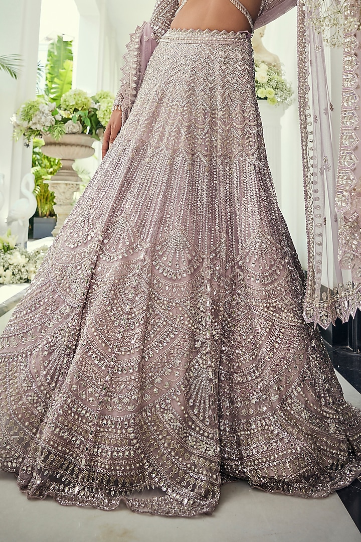 Lilac Net Sequins & Cutdana Embroidered Bridal Lehenga Set by Isa by Dolly Wahal at Pernia's Pop Up Shop
