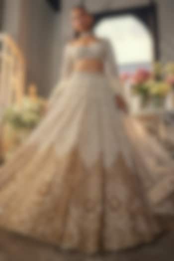 Ivory & Gold Net Sequins & Cutdana Embroidered Bridal Lehenga Set by Isa by Dolly Wahal at Pernia's Pop Up Shop