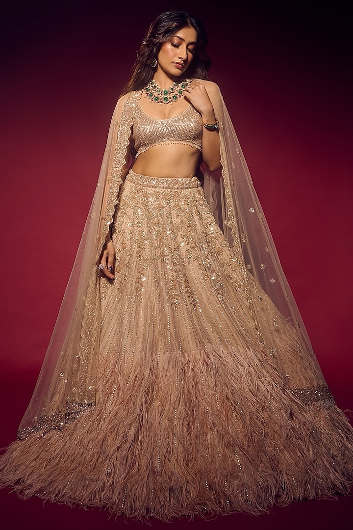 Peachy Gold Net Sequins & Crystal Hand Embroidered Bridal Lehenga Set by Isa by Dolly Wahal at Pernia's Pop Up Shop