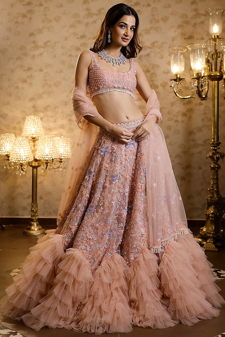 Peach Net Frilled Lehenga Set by Isa by Dolly Wahal